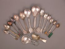 Appraisal: Decorative Travel Spoons Lot of sixteen unique commemorative spoons with