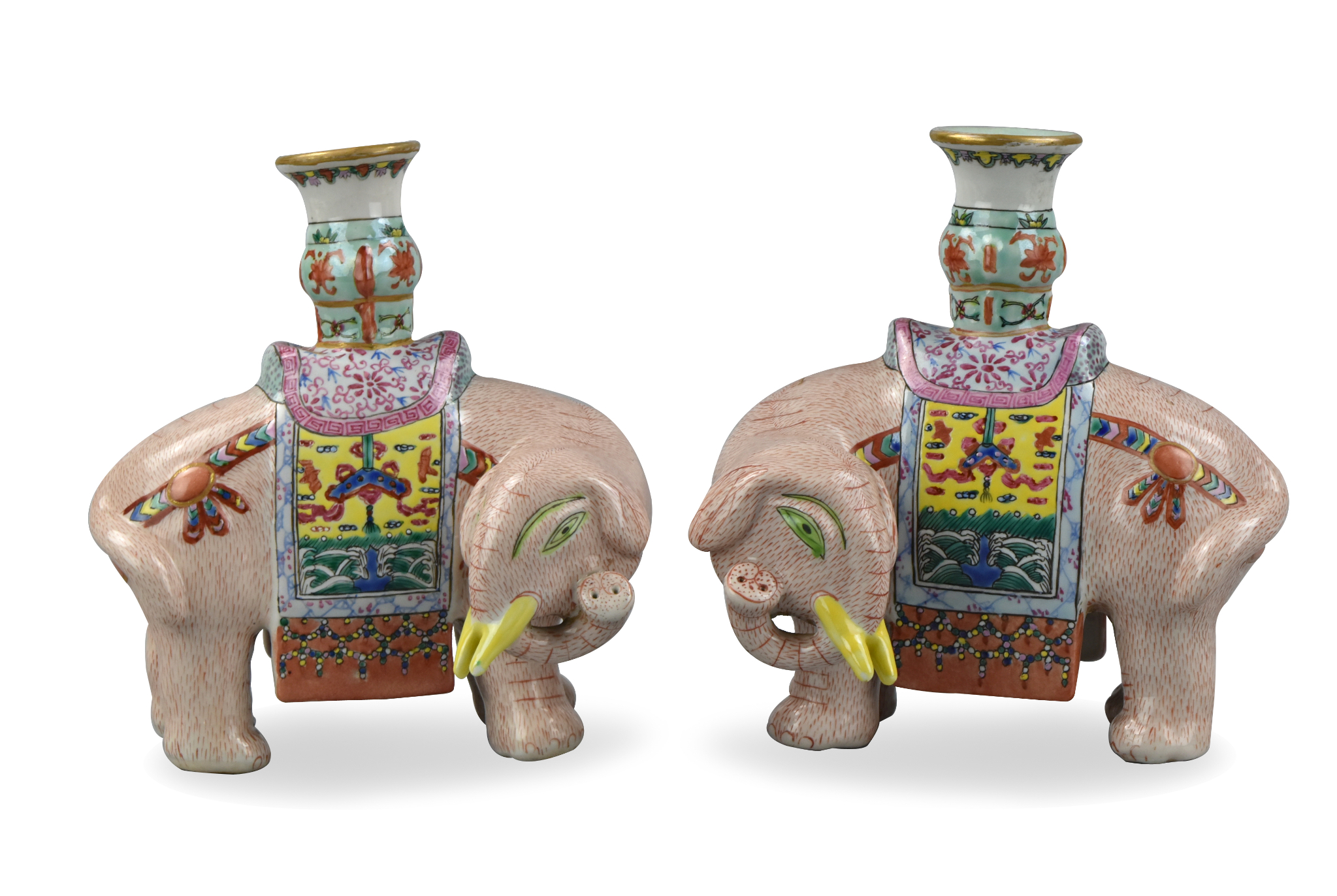 Appraisal: A pair of Chinese th C famille rose elephant candlesticks