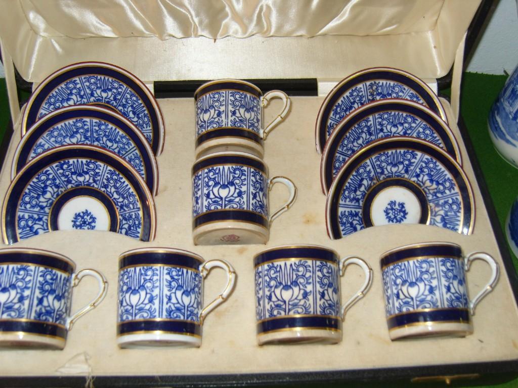 Appraisal: A cased set of Royal Worcester coffee cans and saucers