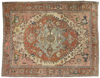 Appraisal: Heriz rug pale blue and ivory central medallions on red