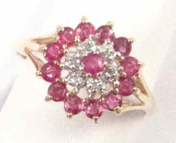 Appraisal: RUBY DIAMOND AND TEN KARAT GOLD RING set with round-cut