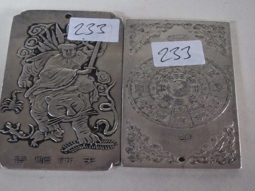 Appraisal: Lot comprising two Chinese white metal plaques one with year