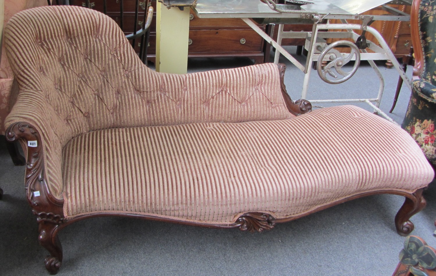 Appraisal: A Victorian mahogany framed chaise longue with serpentine seat and