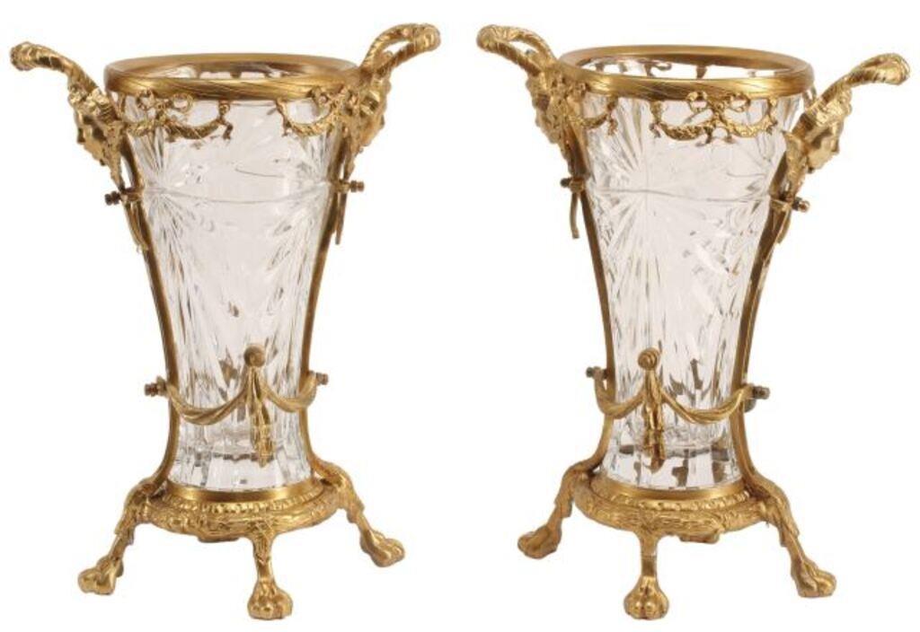 Appraisal: pair Baccarat style crystal urns with bronze dore mounts approx