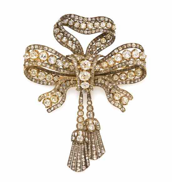 Appraisal: A Victorian Yellow Gold and Diamond Bow Brooch consisting of