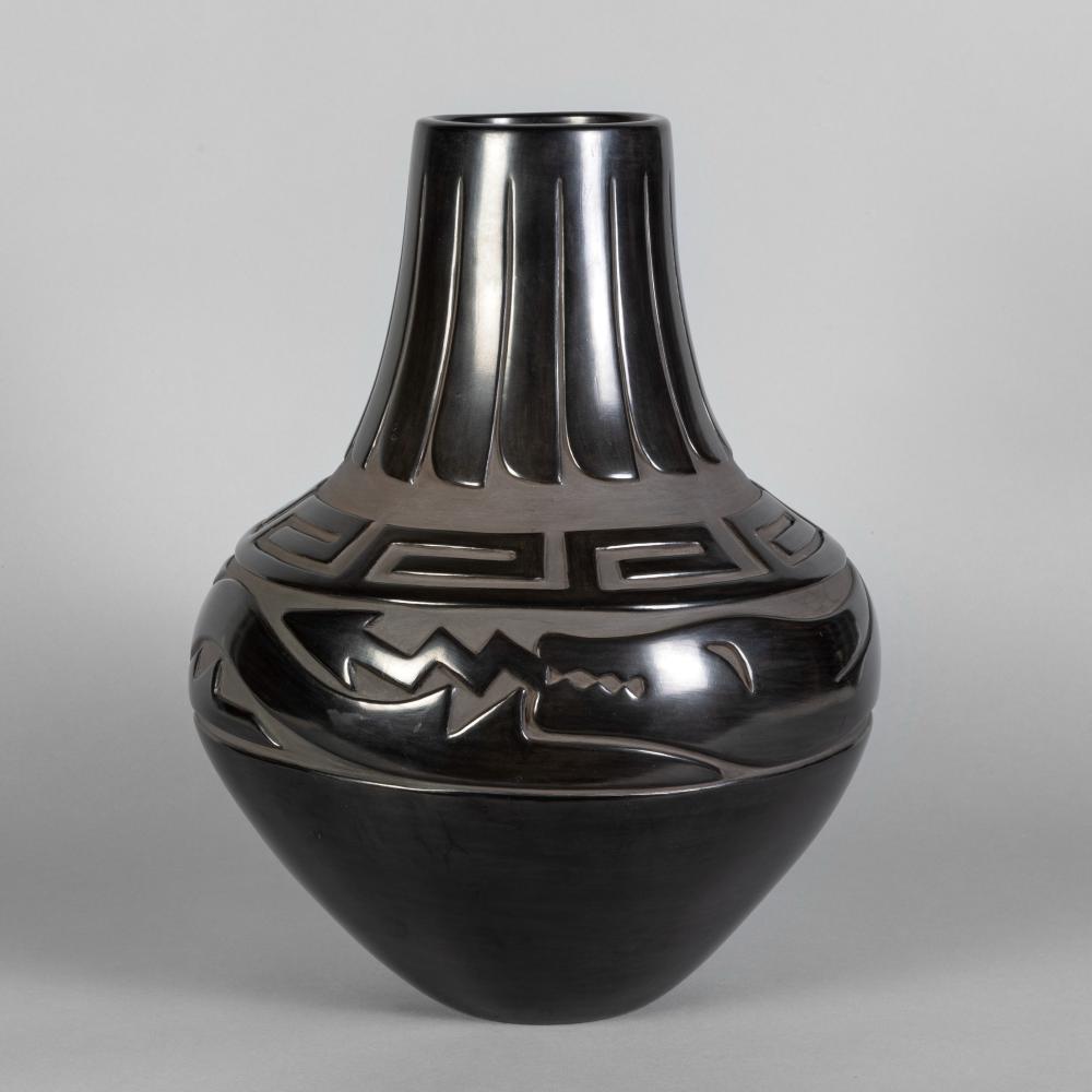 Appraisal: ELIZABETH NARANJO CARVED AVANYU FEATHER DESIGN BLACKWARE VASE CA Elizabeth