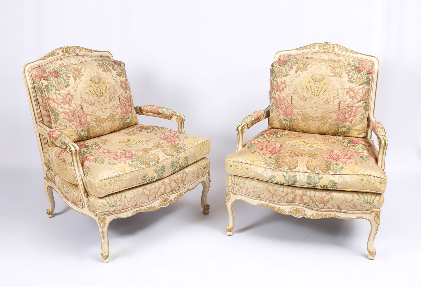 Appraisal: PAIR CARVED FRENCH OPEN ARMCHAIRS French carved armchairs upholstered in