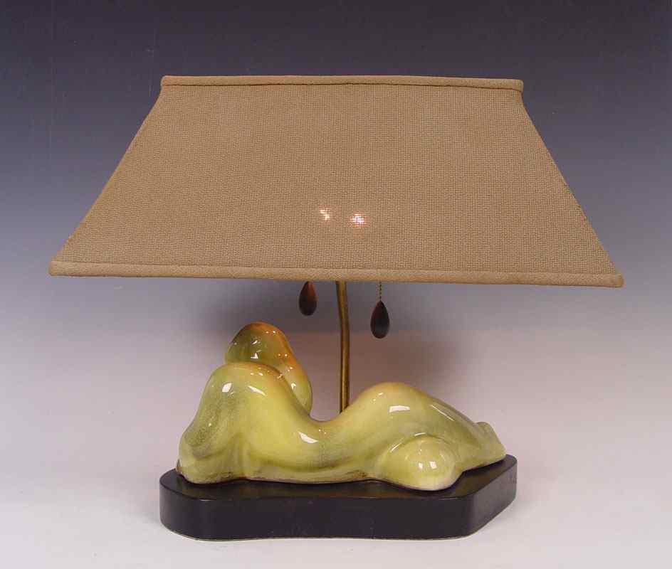 Appraisal: HEIFETZ CERAMIC ABSTRACT LAMP Ceramic abstract woman in repose on