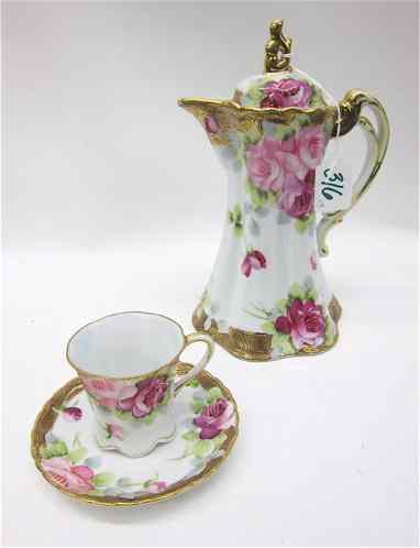 Appraisal: THIRTEEN PIECE NIPPON PORCELAIN CHOCOLATE SET hand painted rose pattern