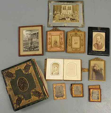 Appraisal: Ornate Victorian album with family photographs incl one of a