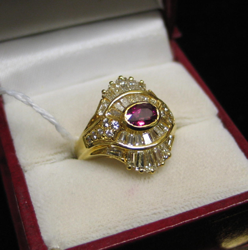 Appraisal: RUBY DIAMOND AND EIGHTEEN KARAT GOLD RING centering a single