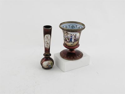 Appraisal: A small Viennese enamelled urn decorated with an oval polychrome