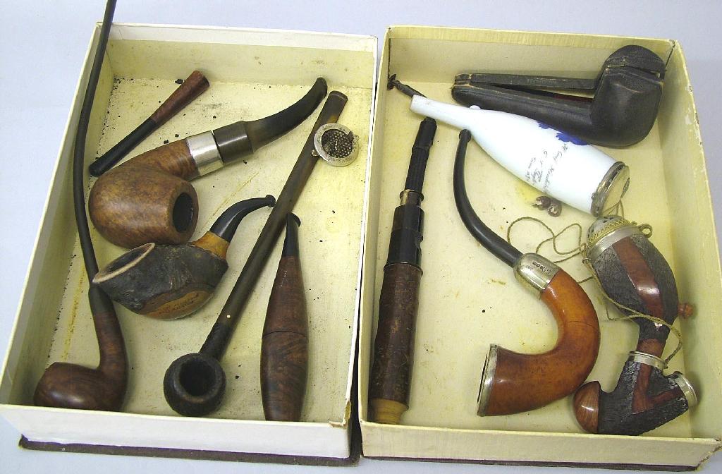 Appraisal: Nine various wooden smoking pipes and a porcelain pipe etc