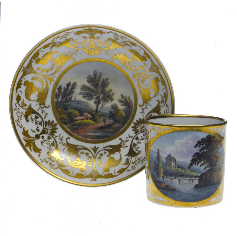 Appraisal: A DERBY COFFEE CAN AND SAUCER painted by Jesse Mountford