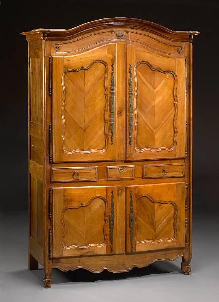 Appraisal: A Louis XV Provincial cherry cupboard second half th century