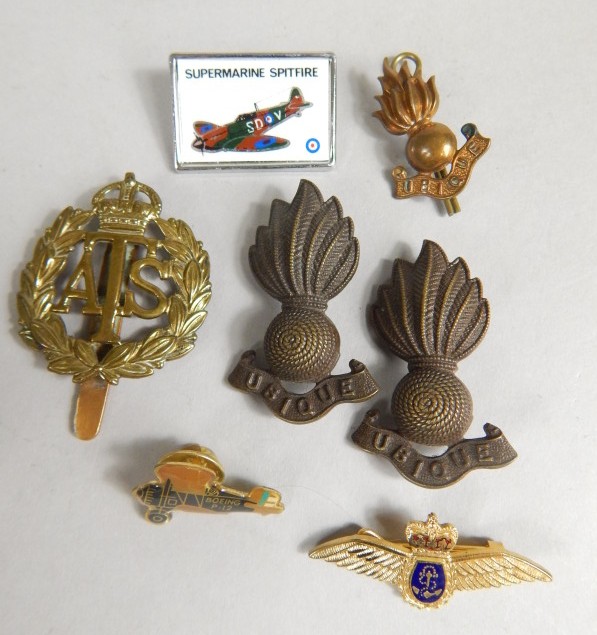 Appraisal: An ATS brass cap badge cm high Super Marine Spitfire