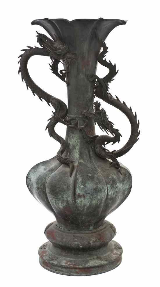 Appraisal: A Large Chinese Bronze Vase with Dragon having flared mouth