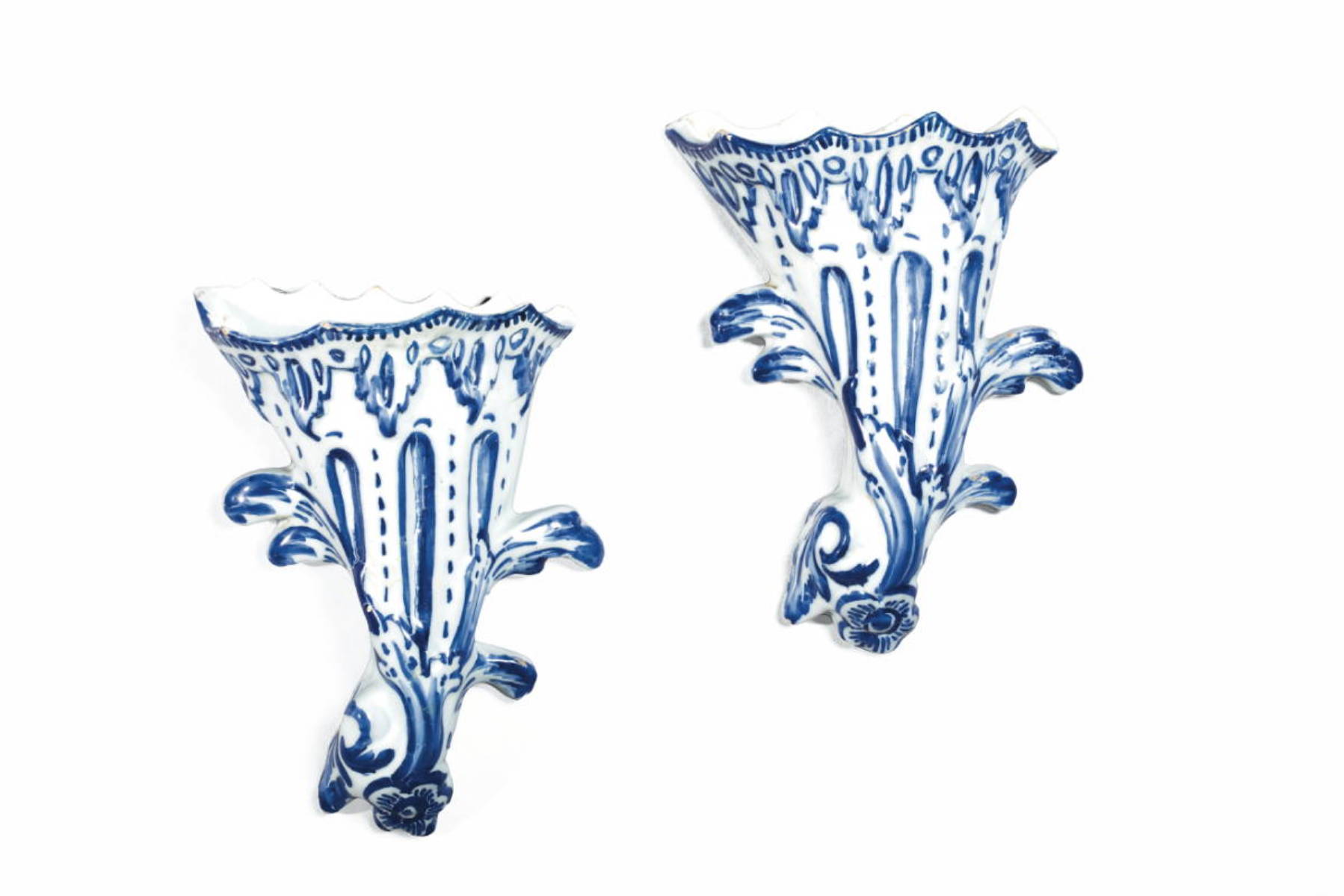 Appraisal: PAIR OF ENGLISH DELFT BLUE AND WHITE WALL POCKETS PROBABLY