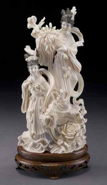 Appraisal: Chinese carved ivory figure group International buyers should note that