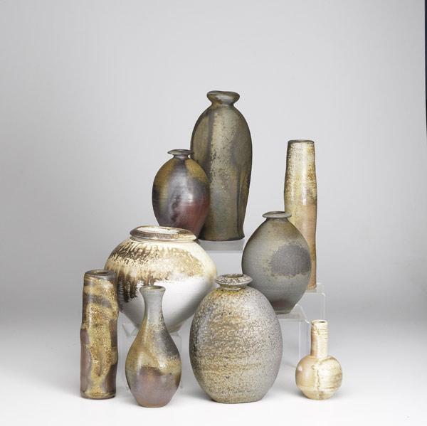 Appraisal: JACK TROY Nine woodfire stoneware vases Each signed Larger x