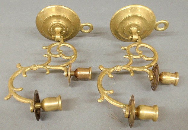 Appraisal: - Pair of brass wall sconces each with two candle