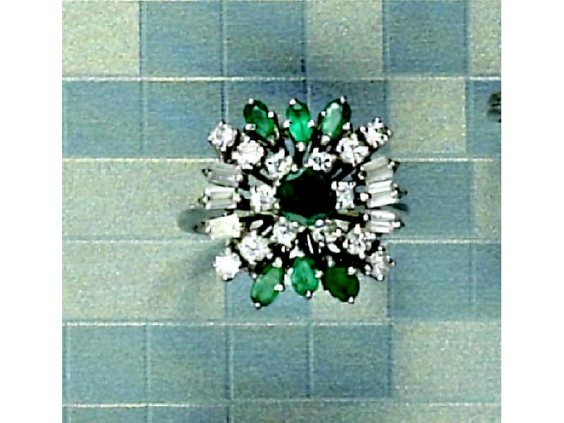 Appraisal: EMERALD AND DIAMOND RING k white gold cocktail ring centering