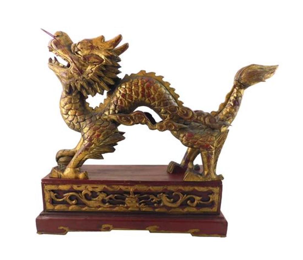 Appraisal: ASIAN Carved wooden Chinese Foo dragon on stand the dragon