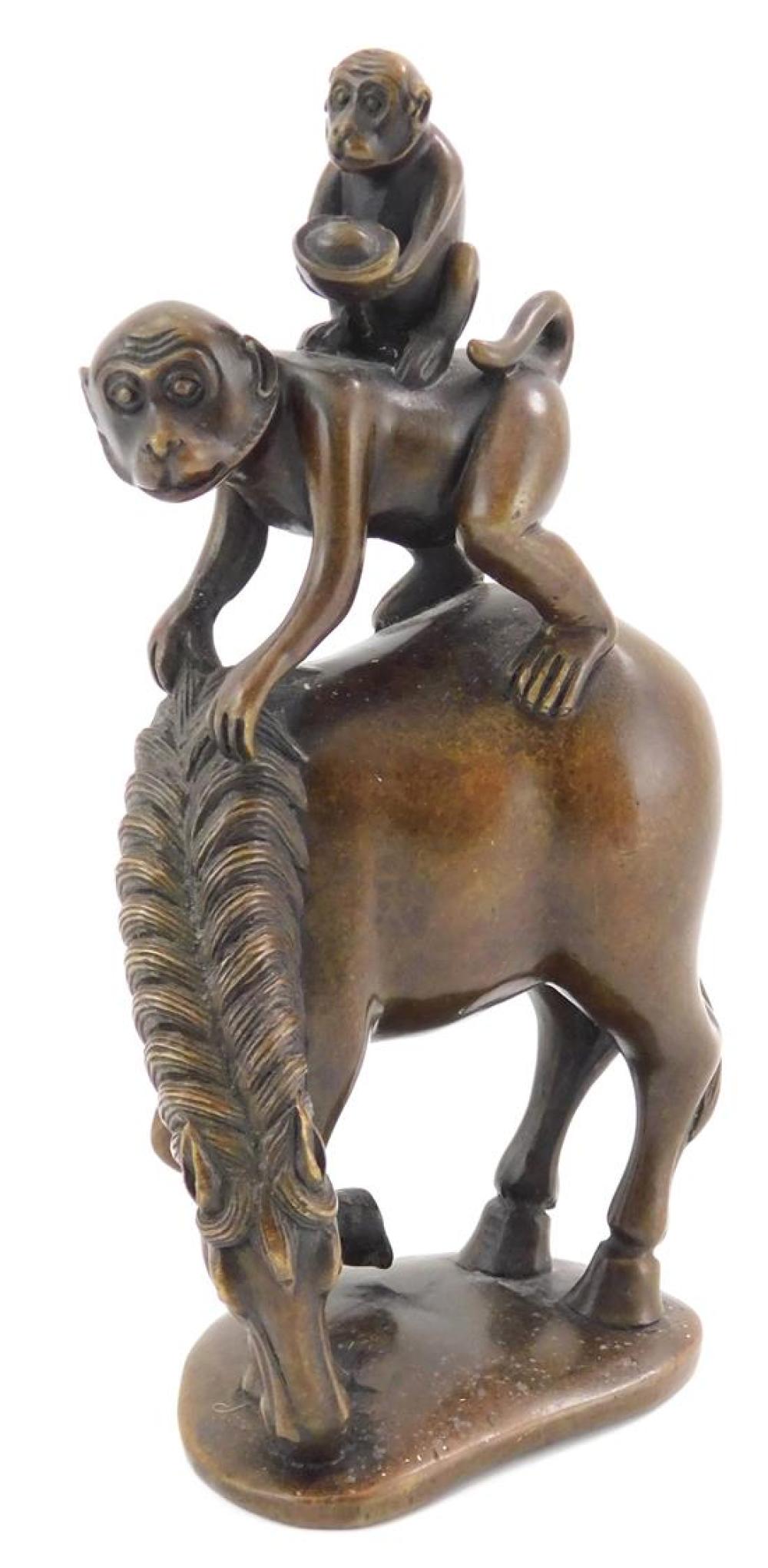 Appraisal: ASIAN Bronze sculpture of monkeys on horse Japanese bronze one