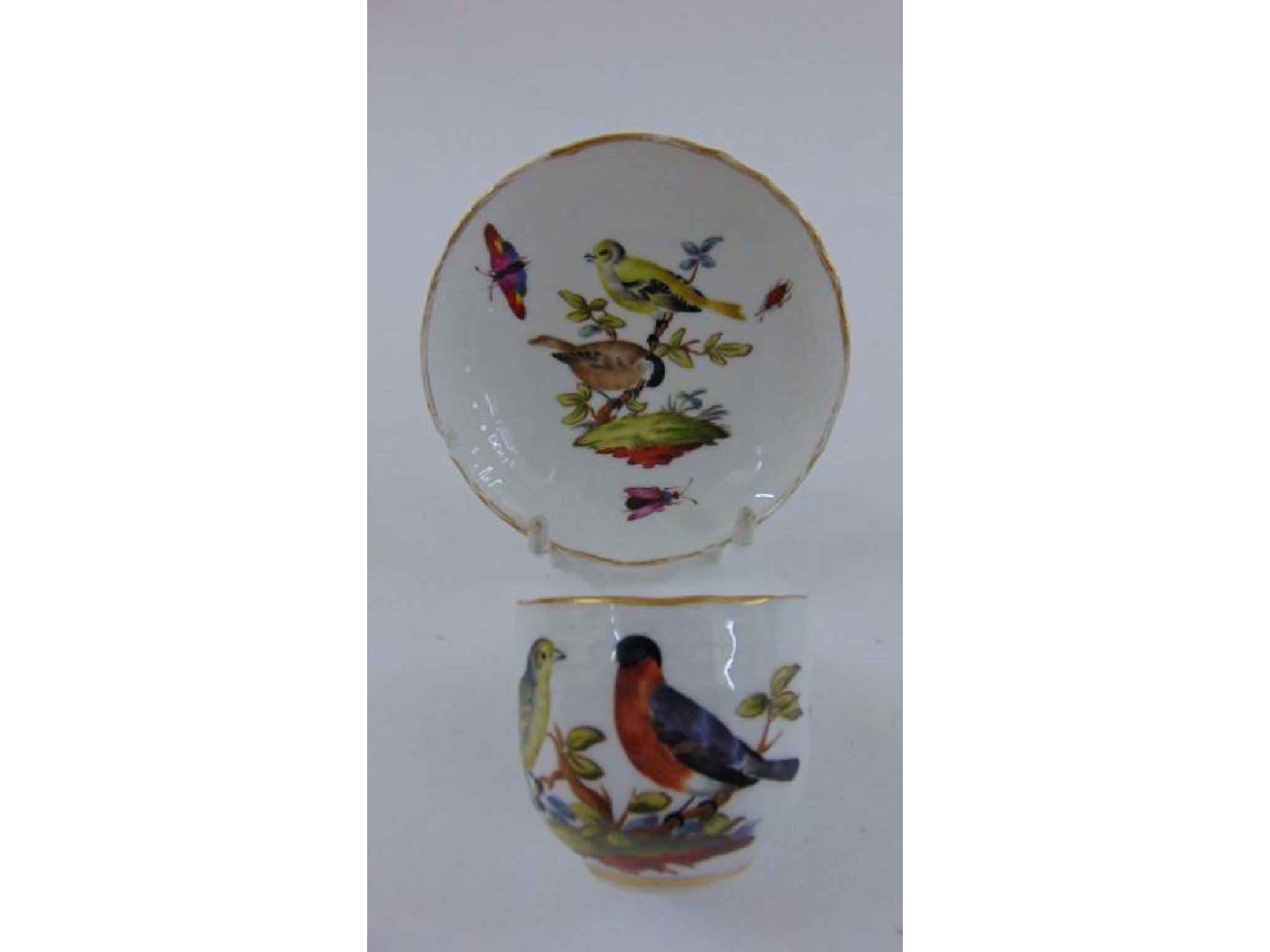 Appraisal: A th century Meissen cabinet cup and saucer decorated with