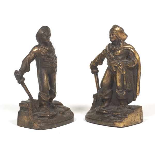 Appraisal: PAIR OF VICTORIAN GILT IRON AND BRASS PIRATE DOOR STOPPERS