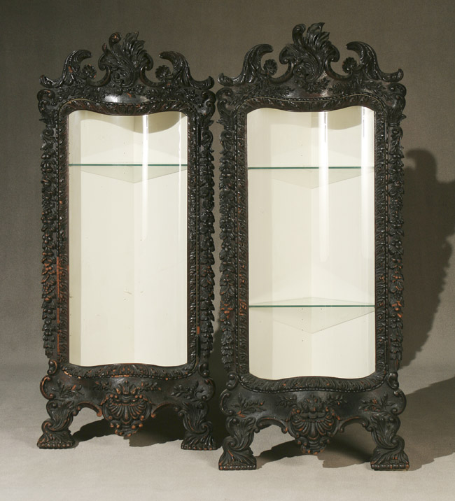 Appraisal: Pair of Continental Baroque Style Dark Stained Oak Serpentine Corner