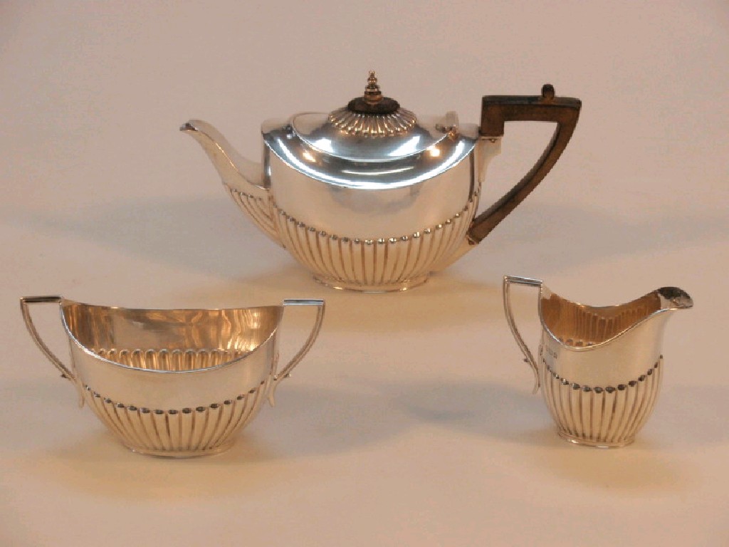 Appraisal: An Edward VII silver bachelors tea service of boat shape