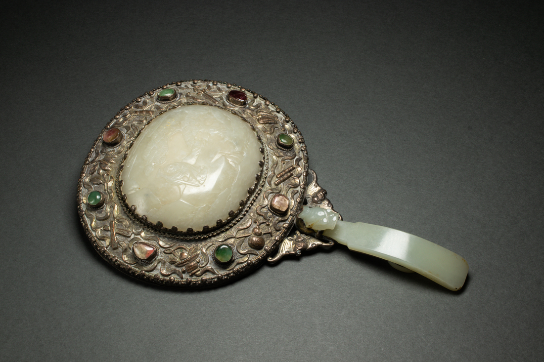 Appraisal: CHINESE SILVER MOUNTED WHITE JADE HAND MIRROR Chinese silver mounted