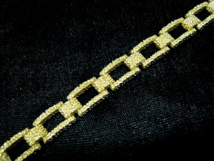 Appraisal: karat yellow gold flexible gold link braceletNugget textured rectangular link