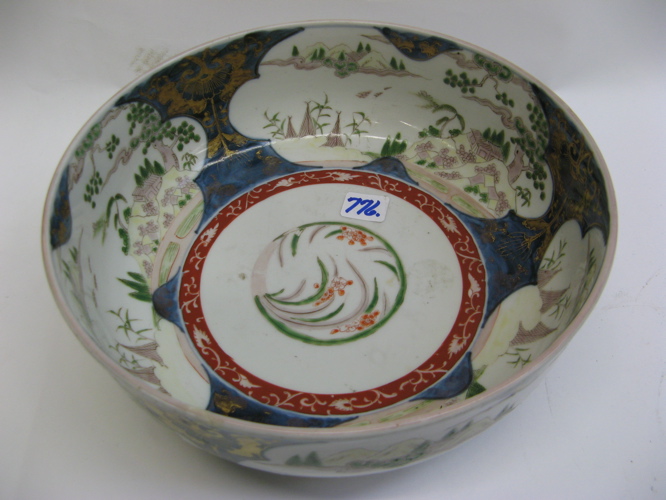 Appraisal: AN IMARI PORCELAIN CENTER BOWL hand painted with three shaped