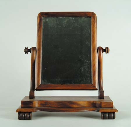 Appraisal: RECTANGULAR CHEST TOP DRESSING MIRROR Scroll supports on a serpentine