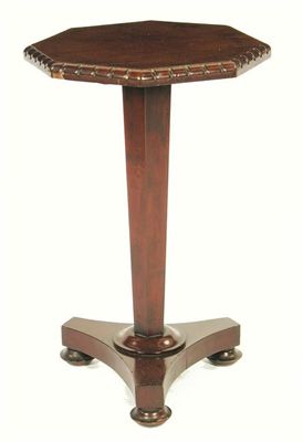 Appraisal: A Victorian mahogany occasional table the veneered octagonal top with