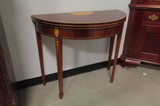 Appraisal: REPRODUCTION DEMILUNE TABLE Walnut flip top table with faux inlay