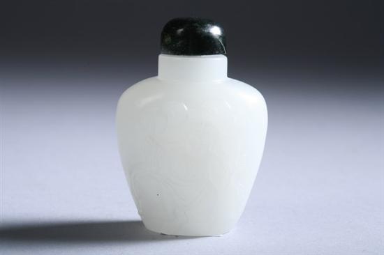 Appraisal: CHINESE WHITE JADE SNUFF BOTTLE Qianlong period Of flattened ovoid-form