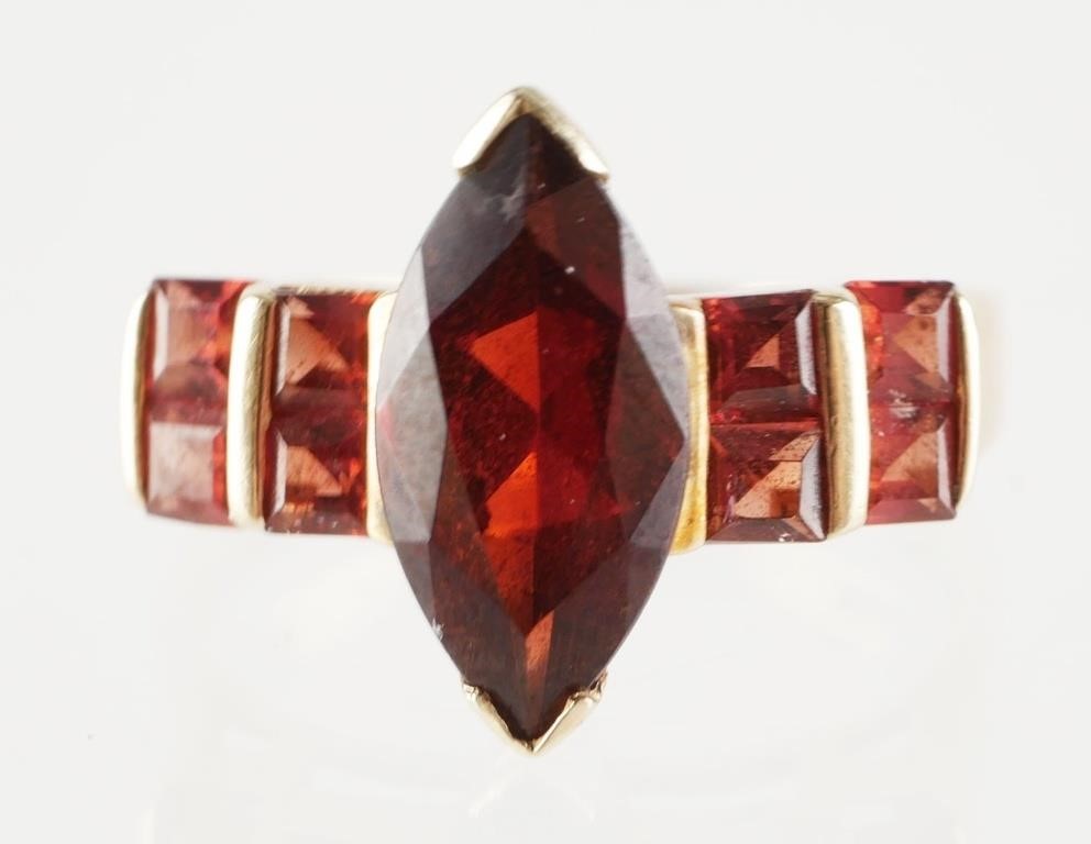 Appraisal: Pretty karat gold ring that features a marquise cut garnet