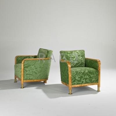 Appraisal: EUROPEAN ART DECO Pair of club chairs s Solid maple