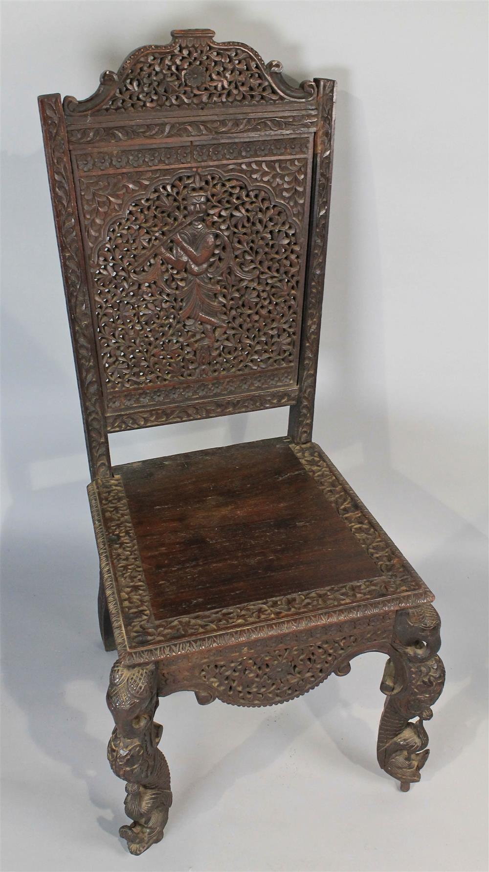 Appraisal: ANGLO-INDIAN CARVED HARDWOOD SIDE CHAIR having an arched crest rail