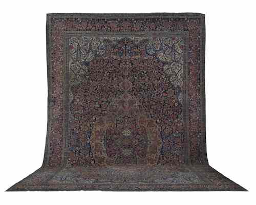 Appraisal: Feraghan carpet ca with a central medallion and floral patterns