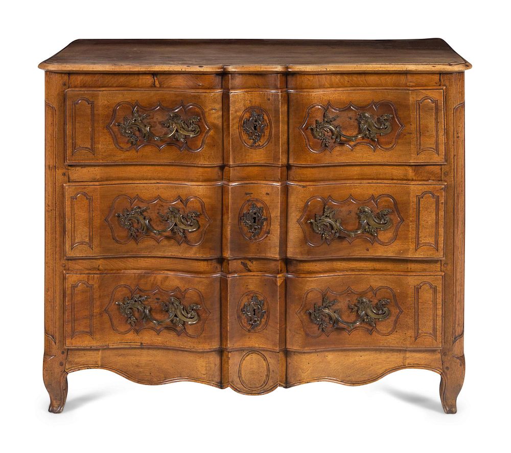 Appraisal: A Louis XV Provincial Walnut Serpentine-Front Commode A Louis XV