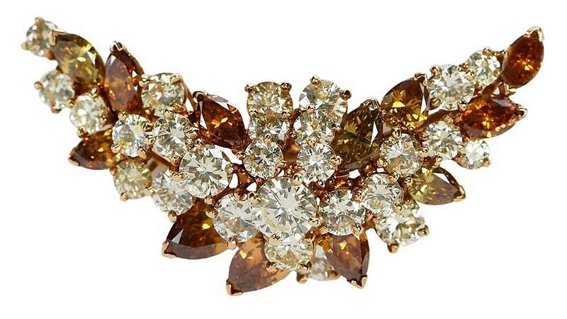 Appraisal: kt Multicolored Diamond Brooch center round brilliant diamond estimated total