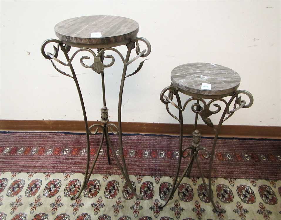 Appraisal: TWO MATCHING PEDESTAL PLANTSTANDS each having a round marble top