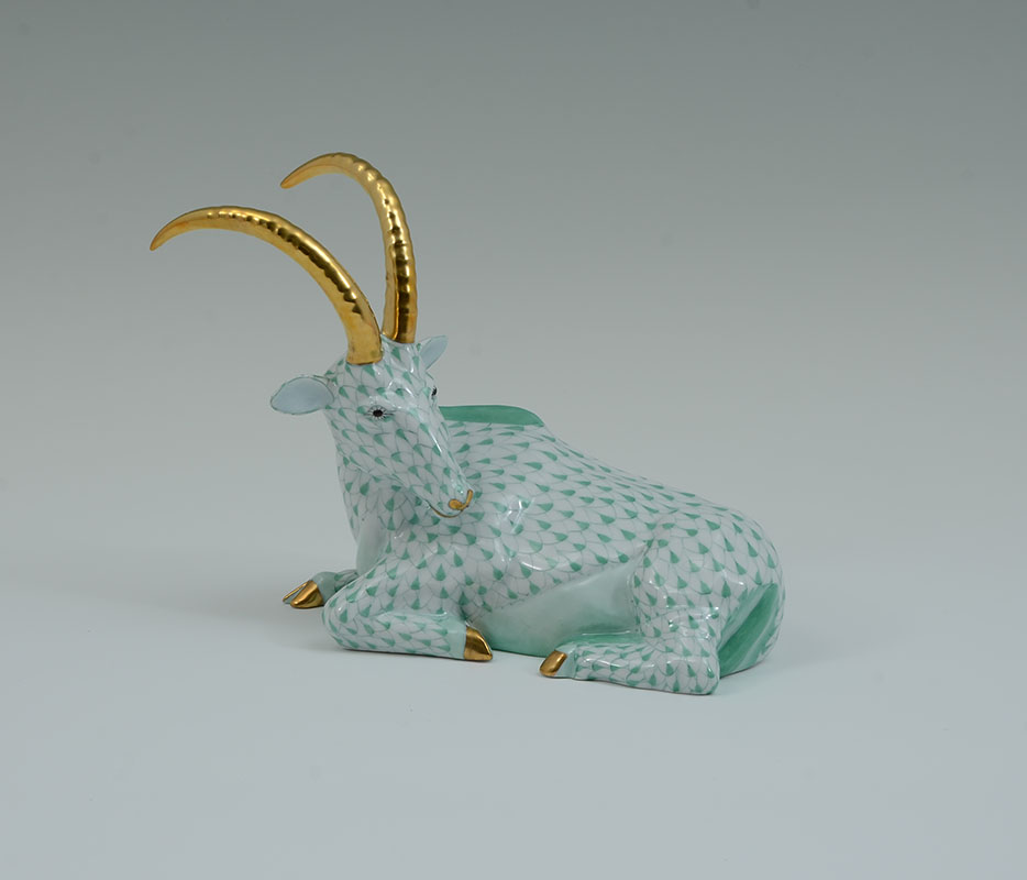 Appraisal: HEREND GREEN FISHNET ANTELOPE PORCELAIN FIGURINE Green fishnet figure of