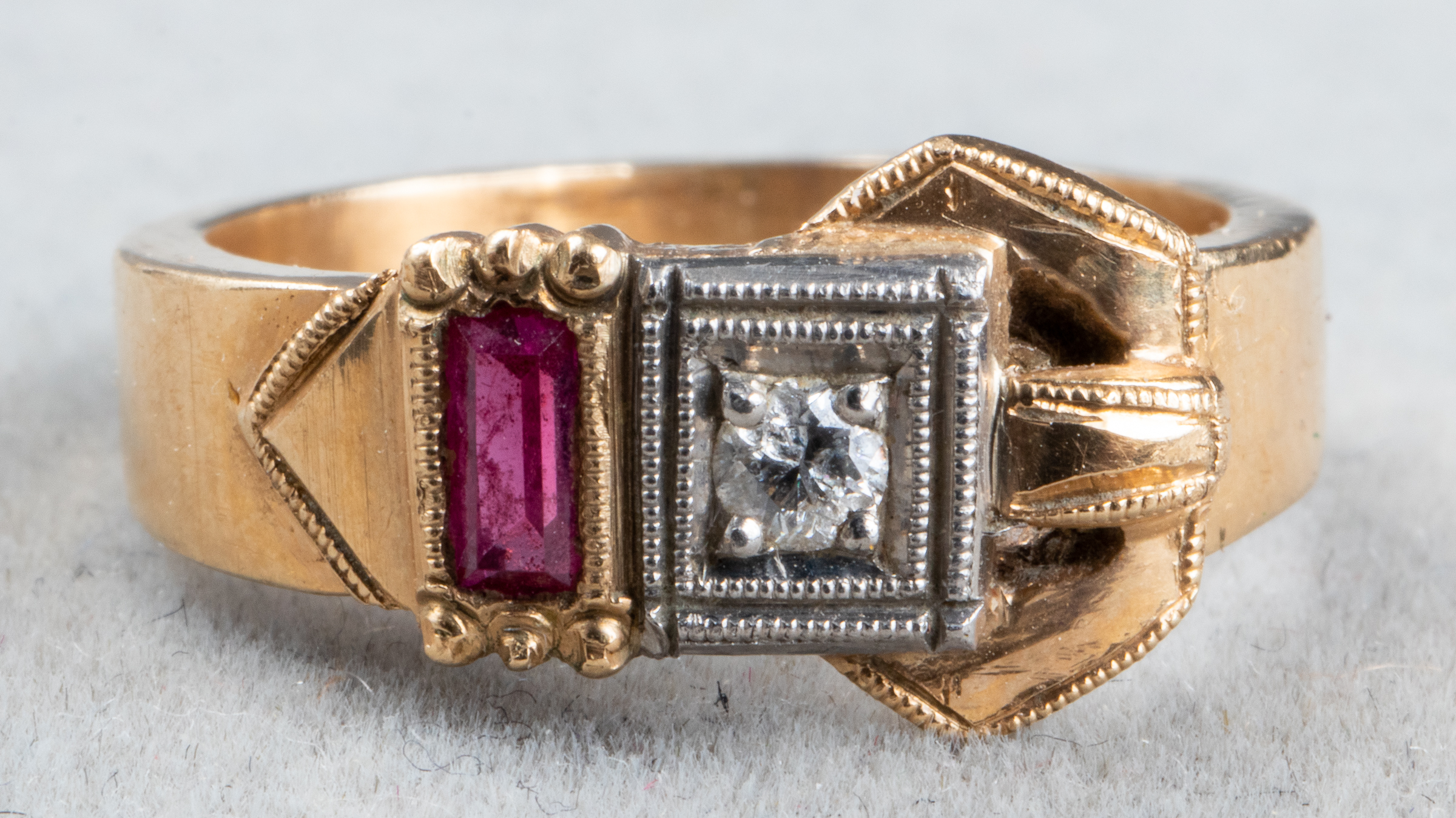 Appraisal: EDWARDIAN K GOLD DIAMOND RUBY BUCKLE RING Edwardian K yellow