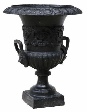 Appraisal: Classical style cast iron garden urn th c with egg-and-dart