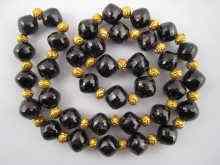 Appraisal: An antique necklace comprising faceted garnet beads approx mm diameter